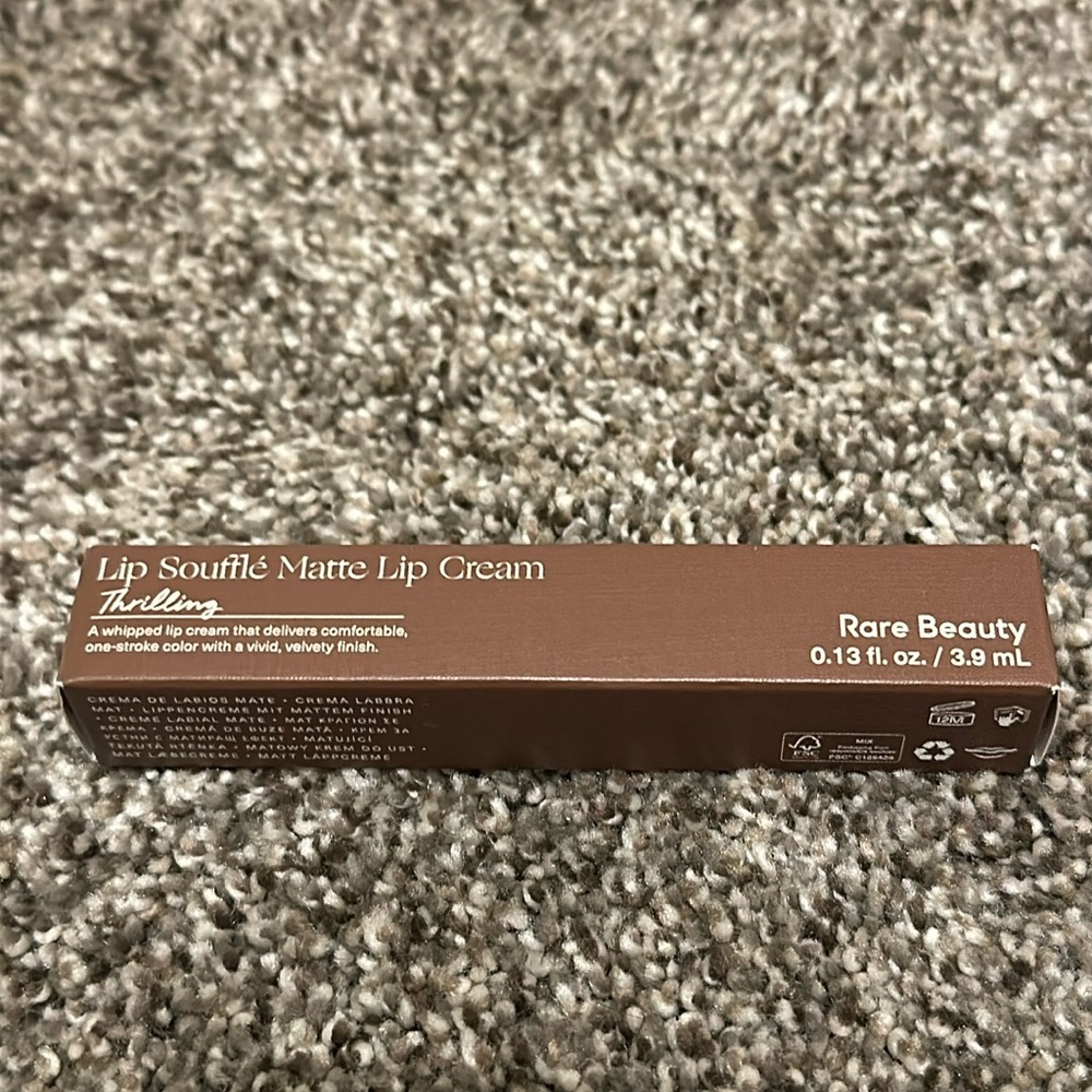 Rare Beauty lip cream in "Thrilling"